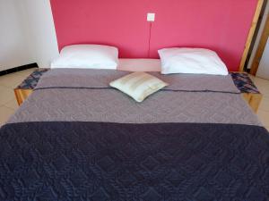 Letto o letti in una camera di Questel BronQ