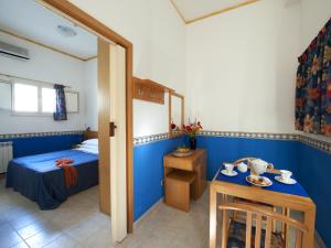 Posteľ alebo postele v izbe v ubytovaní Villaggio Albergo Internazionale La Plaja