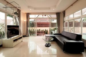 Posezení v ubytování Hansa Paradise Hill Pool Villa