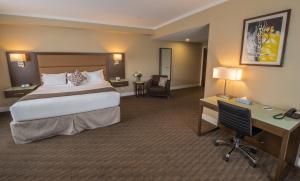 Ліжко або ліжка в номері MStar Hotel