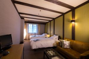 Postel nebo postele na pokoji v ubytování Shakespeare Hotel