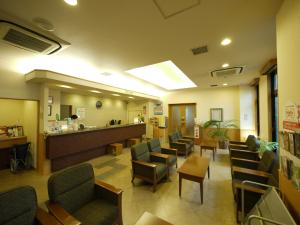 TV a/nebo společenská místnost v ubytování Hotel Route-Inn Tsubamesanjo Ekimae + 23 fotografií