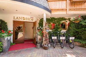 a group of bikes parked outside of a store at Ferienappartements Landhof in Ellmau