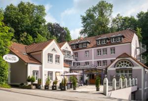 a row of buildings on a city street at Hotel Atrium Garni in Passau