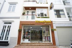 a store front of a home island hotel at Homeland Hotel in Da Lat