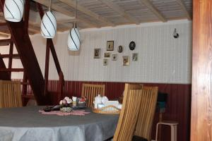 Posezení v ubytování Posti Holiday Home