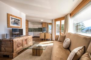 Μια τηλεόραση ή/και κέντρο ψυχαγωγίας στο Hotel Sarain Active Mountain Resort