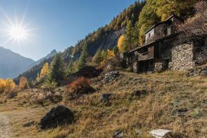 a house on the side of a mountain at Maison I Love Mont Blanc in Courmayeur