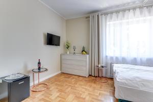 Postel nebo postele na pokoji v ubytování Meduza Sopot