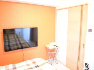 TV a/nebo společenská místnost v ubytování Mango Resort Okinawa Chatan