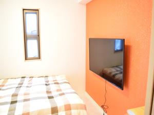 Postel nebo postele na pokoji v ubytování Mango Resort Okinawa Chatan