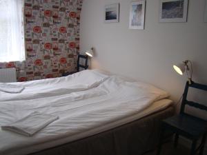 Postel nebo postele na pokoji v ubytování ÖlandsRo B&B