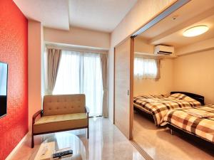 Postel nebo postele na pokoji v ubytování Mango Resort Okinawa Chatan