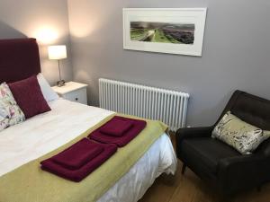 Postel nebo postele na pokoji v ubytování Curbar Hillside B&B