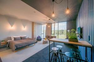Uma área de estar em Urbihop Hotel