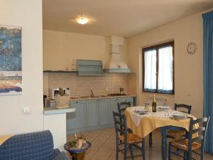 Kuchyň nebo kuchyňský kout v ubytování Residence Terme Di Sorano
