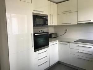 Kuchyň nebo kuchyňský kout v ubytování Dominion Beach House