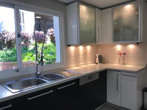 Kuchyň nebo kuchyňský kout v ubytování Dominion Beach House