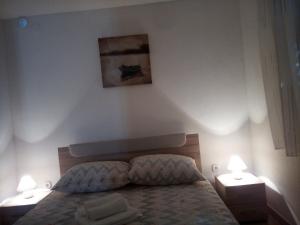 Postel nebo postele na pokoji v ubytování Apartman Pajo