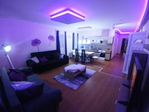 Posezení v ubytování Sarok Apartmanház