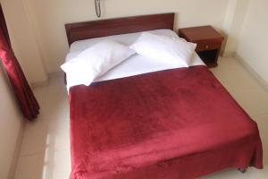 Postel nebo postele na pokoji v ubytování Hotel Vigua