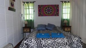 Una cama o camas en una habitación de Namaste