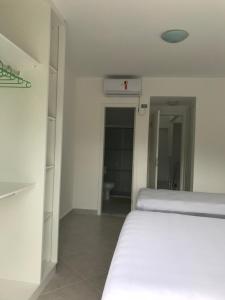 Villaggio Juquehy客房内的一张或多张床位