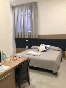 Postel nebo postele na pokoji v ubytování Al Pozzo di Luce Venezia Suites