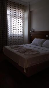 Postel nebo postele na pokoji v ubytování Hotel Berlin