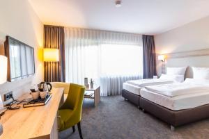 Postel nebo postele na pokoji v ubytování Hotel Engel
