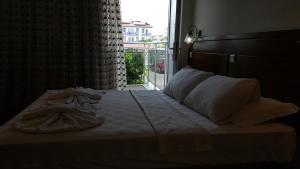 Postel nebo postele na pokoji v ubytování Hotel Berlin