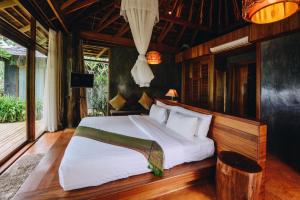 Postel nebo postele na pokoji v ubytování Andalay Beach Resort Koh Libong + 37 fotografií