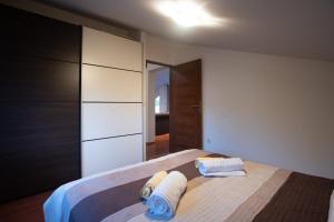 Postel nebo postele na pokoji v ubytování Apartman NANE
