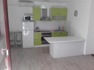 Dapur atau dapur kecil di Apartment Beno