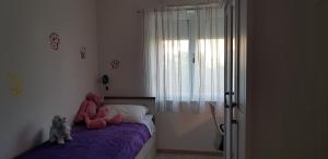 Postel nebo postele na pokoji v ubytování Apartmani Sanja