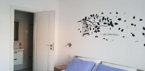 Postel nebo postele na pokoji v ubytování Apartmani Sanja