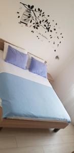 Postel nebo postele na pokoji v ubytování Apartmani Sanja