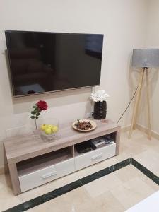TV a/nebo společenská místnost v ubytování Apartamento Ciudad del Tajo