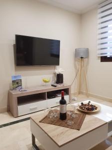 TV a/nebo společenská místnost v ubytování Apartamento Ciudad del Tajo