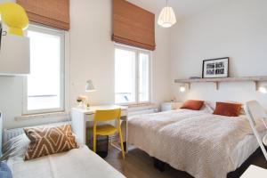 Llit o llits en una habitació de Family Apartment