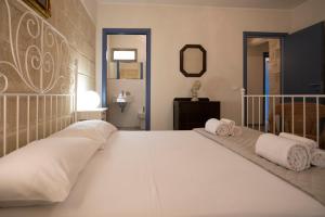 Letto o letti in una camera di Luxury Favignana Villa