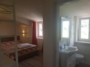 Postel nebo postele na pokoji v ubytování B&B MOLINARI