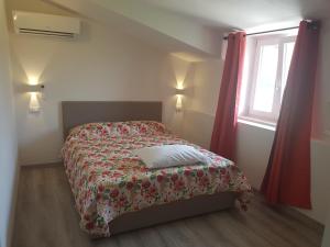 Postel nebo postele na pokoji v ubytování B&B MOLINARI
