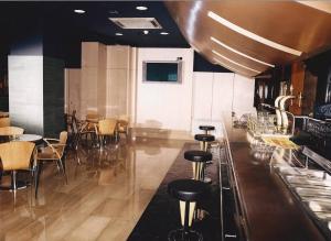 The lounge or bar area at Hostal Torres