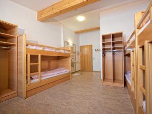 Łóżko lub łóżka w pokoju w obiekcie Ski In-Ski Out - Gästehäuser Saalbach-Hinterglemm - Wallegghof Christianhof