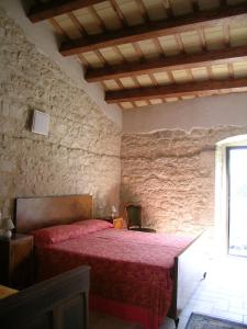 Postel nebo postele na pokoji v ubytování Masseria del Ponte