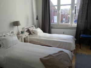 Ein Bett oder Betten in einem Zimmer der Unterkunft Haus MeerZeit