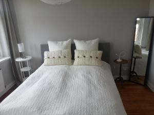 Ein Bett oder Betten in einem Zimmer der Unterkunft Haus MeerZeit