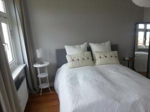 Ein Bett oder Betten in einem Zimmer der Unterkunft Haus MeerZeit