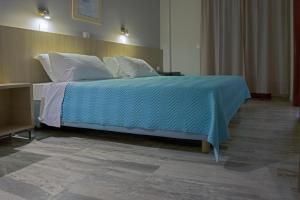 Postel nebo postele na pokoji v ubytování Polyxeni Hotel